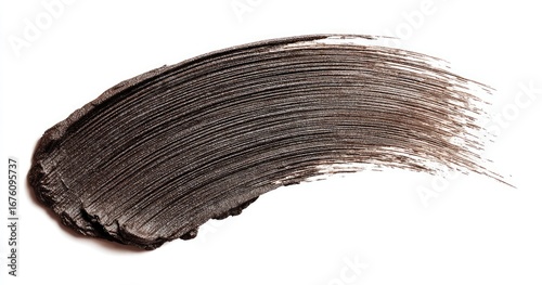 Dark brown mascara smudge on white background