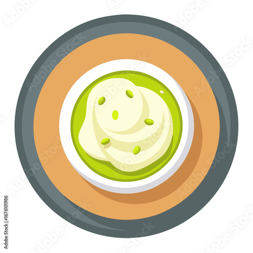 Overhead view of a stylized bowl of creamy dip with green accents