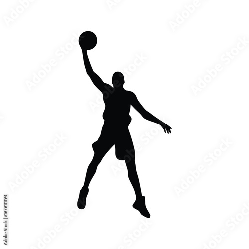 Silhouette of a basketball player in mid air shooting a basketball