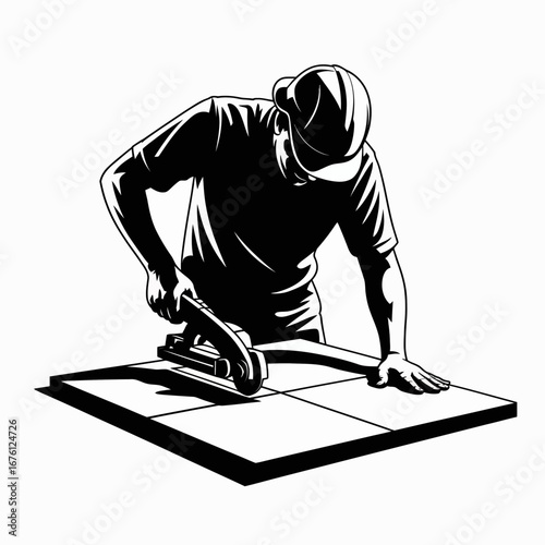 Construction worker laying tiles with a trowel and level