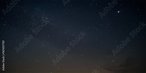 A stunning blue starry night sky with a bright galaxy and cosmic dust
