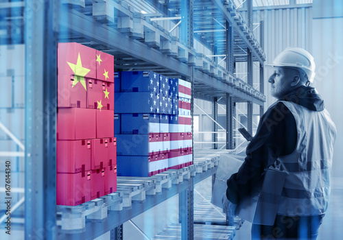 Worker in warehouse with bo...