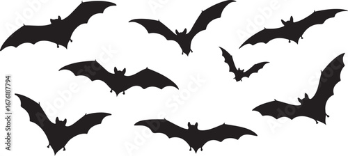 Group of black bat silhouettes flying on a transparent  background bats