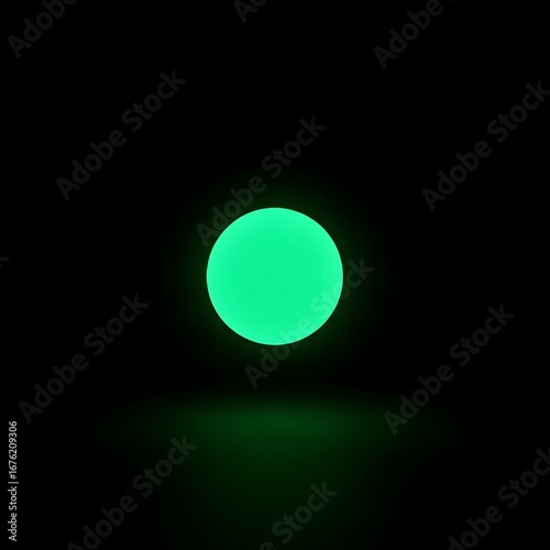 A glowing green circle on a black background, abstract light effect