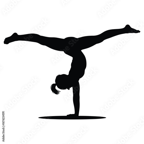 Young girl performing a handstand in gymnastics silhouette