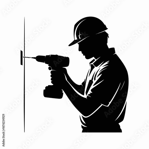 Silhouette of a construction worker drilling a hole in a wall