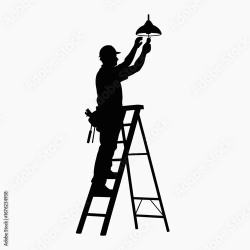 Silhouette of an electrician working on a light fixture while standing on a ladder
