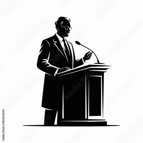 Silhouette of a man in a suit speaking at a podium with a microphone