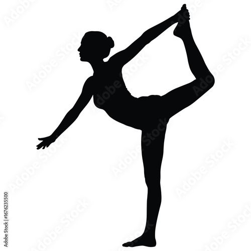 Woman performing yoga dancer pose silhouette