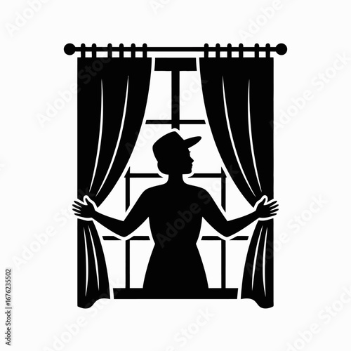 Silhouette of a person opening curtains to look out a window