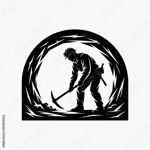 Silhouette of a miner digging with a pickaxe in a cave entrance