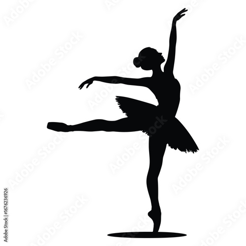 Graceful ballerina performing a ballet pose in silhouette