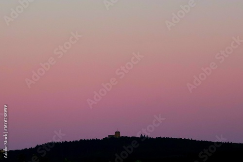 sunset over the old castle