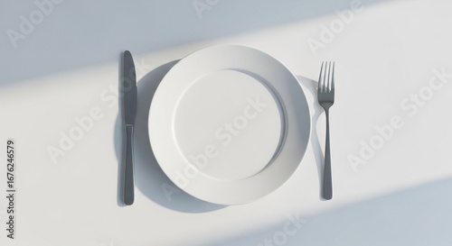 Plate with cutlery on the table