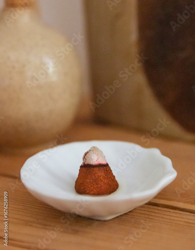 Burning incense cone in house