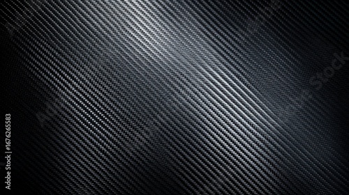 Black carbon fiber texture showing smooth and reflective pattern with diagonal lines and depth, ideal for design inspiration