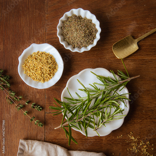herbs and spices on a wooden board