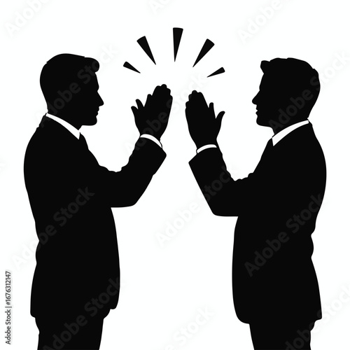 Successful business partners celebrating achievement with a high five gesture, symbolizing teamwork and collaboration for victory