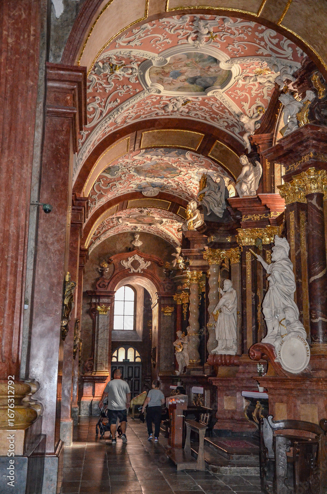 Fototapeta premium Poland, Poznań July 15, 2024, The Collegiate Basilica of Our Lady of Perpetual Help, St. Mary Magdalene and St. Stanislaus the Bishop in Poznań, also known as the Poznań Parish Church, interior