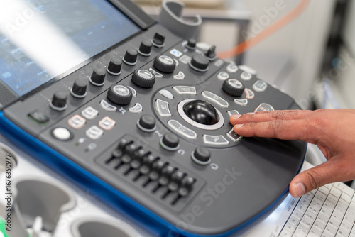 Hands operating Endoscopy equipment 