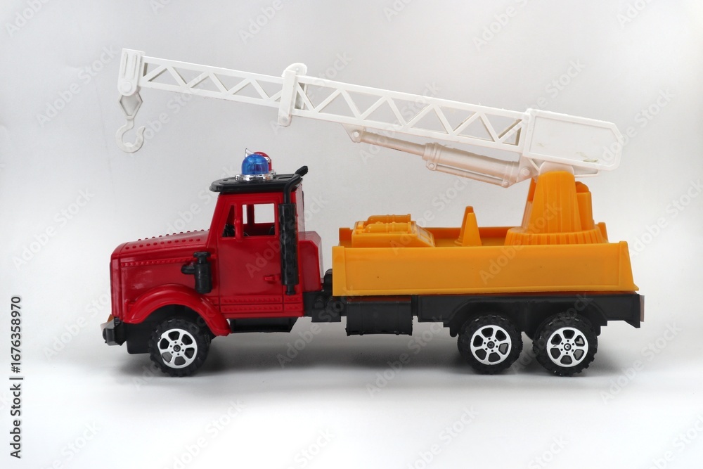 Naklejka premium Side View of Toy Crane Truck with Retracted Boom