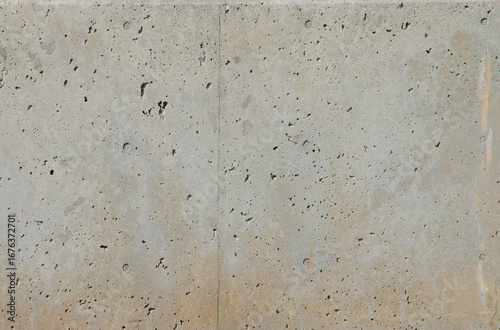 Pocked cement wall