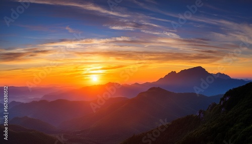 breathtaking sunrise over mountains with vibrant colors and clouds creating a serene atmosphere perfect for nature lovers