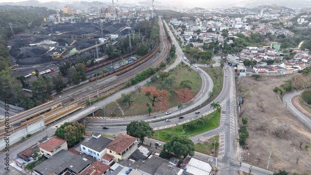 Fototapeta premium Aerial view of Vila Ipanema neighborhood and industrial area in Ipatinga, Minas Gerais, Brazil