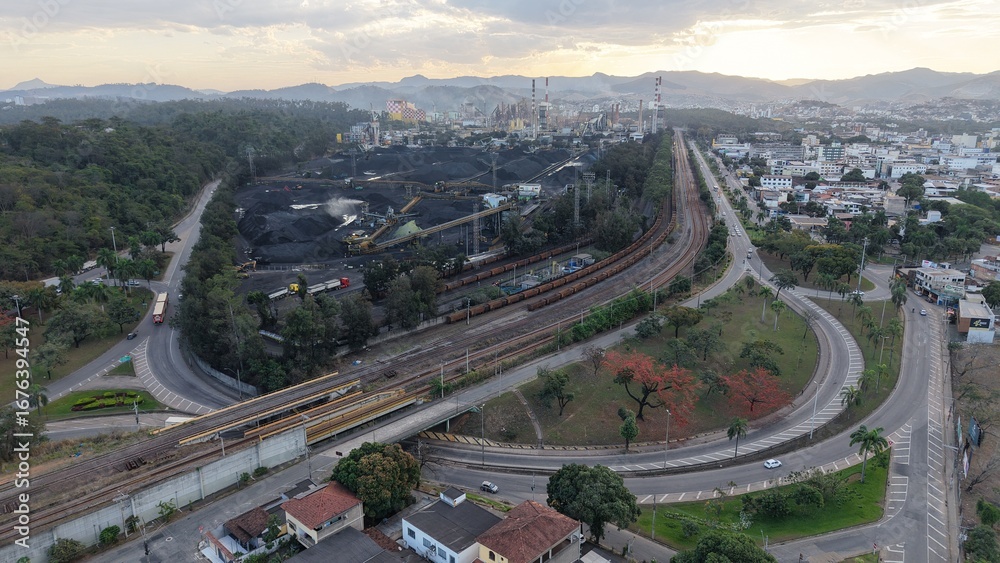 Fototapeta premium Aerial view of Vila Ipanema neighborhood and industrial area in Ipatinga, Minas Gerais, Brazil