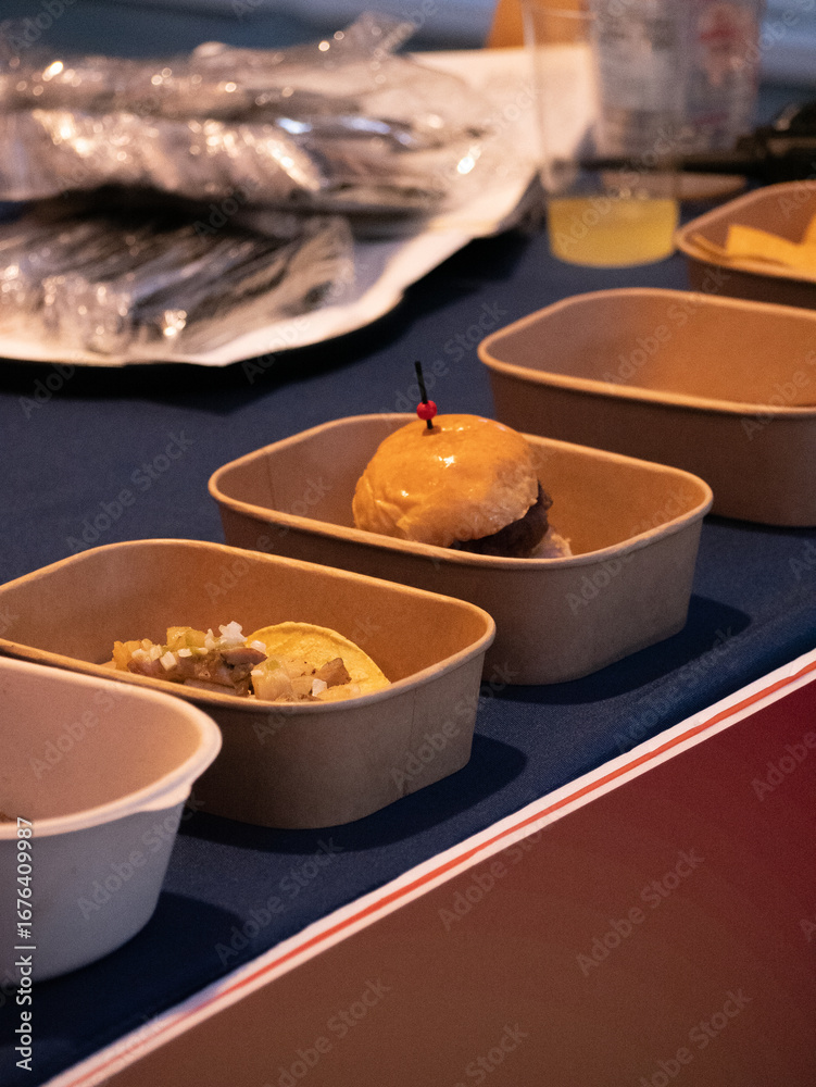 Fototapeta premium Burger and potato chip snacks at Shanghai's Multicultural Latin American Food Market