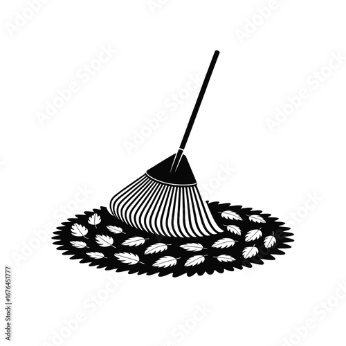 Broom sweeping leaves into a pile on a circular surface ready for collection