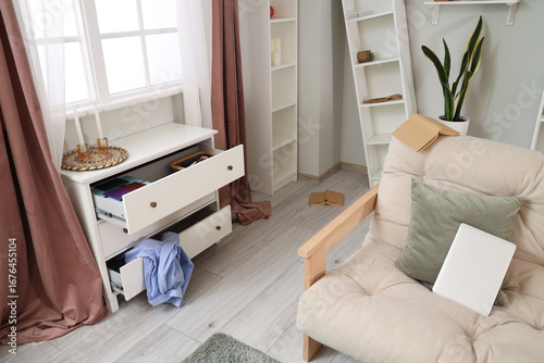 Interior of messy living ro...