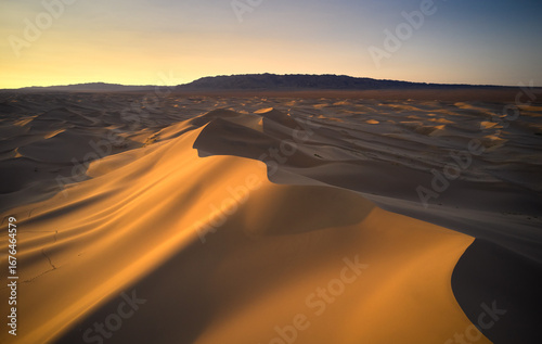 Golden Dunes at Sunrise A Serene and Peaceful Desert Landscape Awaits