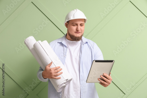 Young male engineer with ta...