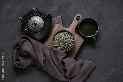Bowl with dried green tea l...