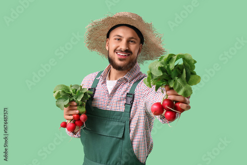 Male farmer with ripe radis...