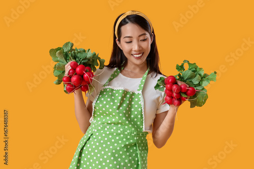 Young Asian housewife with ...