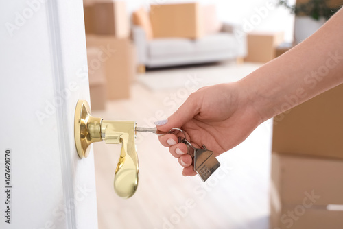 Female hand opening door wi...