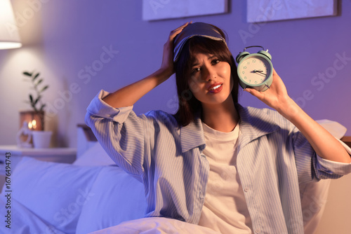 Stressed young woman with a...
