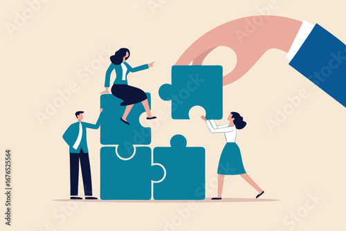 Build your team, leadership to develop teamwork or business partner, cooperate or collaborate for success, assist or help, giant businessman hand connect last jigsaw puzzle to office business team.