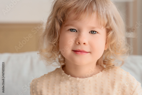 Cute little girl at home, c...