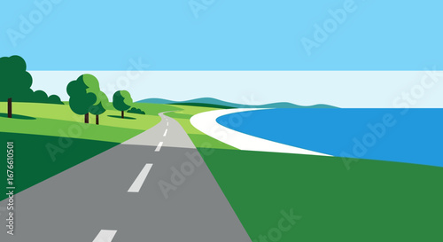 A winding road leading to the coast under a clear blue sky.