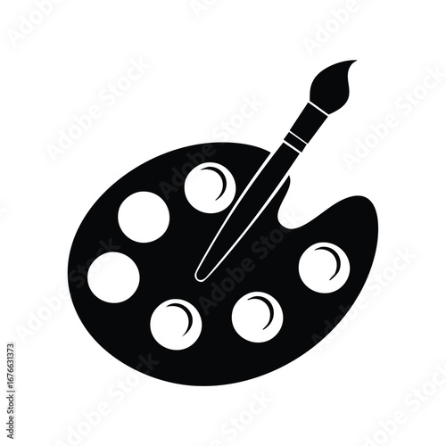 Black paint palette with brush and circular paint wells artist artistic