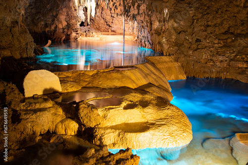 Photos Blue pond in the cave under the ground in Japan, Translation: 玉泉洞 is Gyokusendo