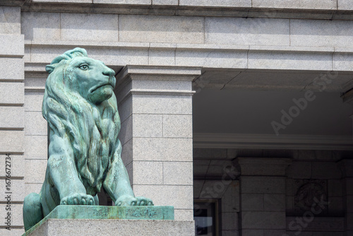 Lion statue at the entrance of the Hyokeikan building at the Tokyo National Museum