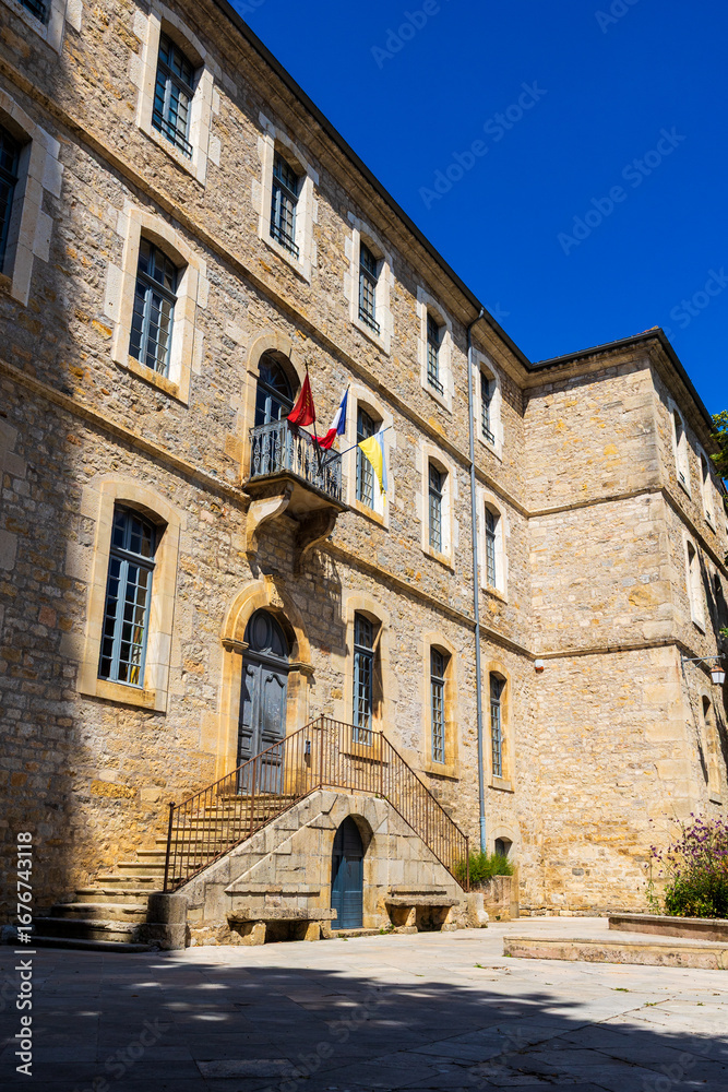 Obraz premium Stone Facade of the Former Convent of the Genovefains, Now the Town Hall of Saint-Antonin-Noble-Val
