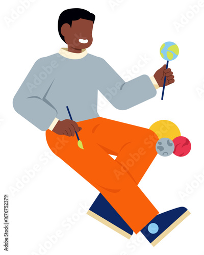 Young man doing solar system science project