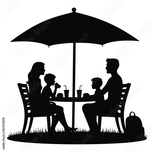 Family eating burgers under umbrella silhouette outdoor dining