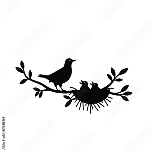 Black silhouette of a bird feeding chicks in a nest on a branch 2