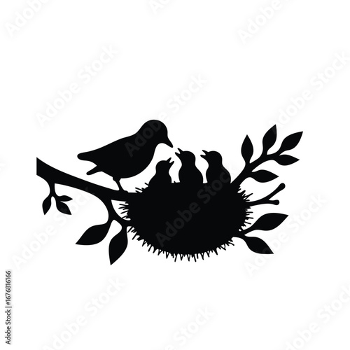 Black silhouette of a bird feeding chicks in a nest on a branch 14
